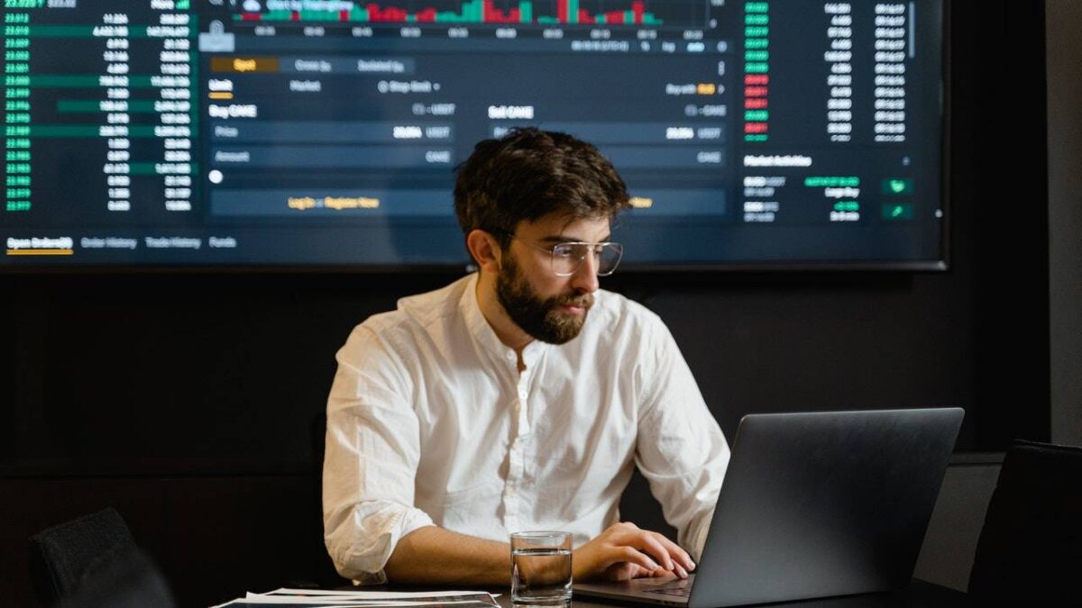 a man working with his laptop